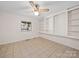 Cozy bedroom with ceiling fan and built-in shelving unit at 1261 Westbrook Cir, Gastonia, NC 28052