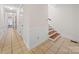Hallway featuring tiled flooring, staircase, and neutral paint at 1261 Westbrook Cir, Gastonia, NC 28052