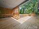 Outdoor patio with benches and partial wood screen offering great outdoor entertaining at 1261 Westbrook Cir, Gastonia, NC 28052