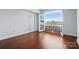 Bedroom with French doors leading to a private balcony offering ample natural light at 1315 East Blvd # 611, Charlotte, NC 28203