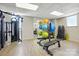 Well-equipped gym featuring a weight machine, benches, and various fitness accessories at 1315 East Blvd # 611, Charlotte, NC 28203