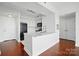 Contemporary kitchen with an island, modern appliances, and plenty of cabinet space for storage at 1315 East Blvd # 611, Charlotte, NC 28203