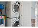 Laundry area with stacked washer and dryer, conveniently located for easy chore management at 1315 East Blvd # 611, Charlotte, NC 28203