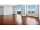 Bright and airy living room with hardwood floors and a balcony offering picturesque views at 1315 East Blvd # 611, Charlotte, NC 28203