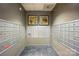 Mailbox area with multiple mailboxes and modern art, providing convenience for residents at 1315 East Blvd # 611, Charlotte, NC 28203