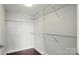 Walk-in closet with ample shelving and rod space for organized storage and easy access at 1315 East Blvd # 611, Charlotte, NC 28203
