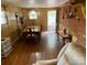 Inviting dining area features wood paneled walls and rustic decor accents at 13427 Homewood Dr, Charlotte, NC 28262