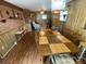 Cozy dining room features a beautiful wooden table and decorative chandelier for a warm atmosphere at 13427 Homewood Dr, Charlotte, NC 28262