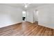 Bedroom featuring hardwood floors, a ceiling fan and access to the en suite bathroom at 138 Shepherd Rd, Mooresville, NC 28115