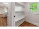 View of kitchen pantry with shelving and natural light streaming through a window at 138 Shepherd Rd, Mooresville, NC 28115