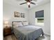 Cozy bedroom with natural light and neutral decor, creating a relaxing atmosphere at 13821 David St, Huntersville, NC 28078