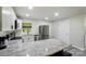 Modern kitchen with stainless steel appliances, granite countertops, and ample cabinet space at 13821 David St, Huntersville, NC 28078