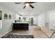 Open-concept living space seamlessly blending the living room, kitchen, and dining areas at 13821 David St, Huntersville, NC 28078