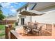 Backyard with a spacious deck, dining set, and an outdoor grill for entertaining at 16121 Wrights Ferry Rd, Charlotte, NC 28278