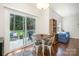 Bright dining area with wood floors and sliding glass doors to the backyard at 16121 Wrights Ferry Rd, Charlotte, NC 28278