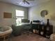 Bright home office with a desk, comfortable chair, and large window at 16121 Wrights Ferry Rd, Charlotte, NC 28278