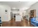 Modern kitchen featuring stainless steel appliances, an island bar, and an open dining area at 16121 Wrights Ferry Rd, Charlotte, NC 28278