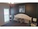 Contemporary bedroom with modern decor, including a zebra print art piece at 1647 Backcreek Ln, Gastonia, NC 28054