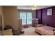Bright bedroom with plush carpet, a ceiling fan, and furniture in a purple decor at 1647 Backcreek Ln, Gastonia, NC 28054