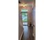 Bright entryway with hardwood floors, a staircase with white railings, and a view of the outdoors at 1647 Backcreek Ln, Gastonia, NC 28054