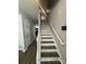 Bright stairway featuring hardwood floors and natural light, with a view of the upstairs hallway at 1647 Backcreek Ln, Gastonia, NC 28054