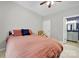 Bedroom includes a ceiling fan and en suite bathroom with vanity at 16714 Hammock Creek Pl, Charlotte, NC 28278