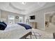 Bright main bedroom features a trey ceiling and large windows offering plenty of natural light at 16714 Hammock Creek Pl, Charlotte, NC 28278