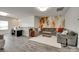 Another view of the spacious bonus room that is perfect for entertaining at 18013 Grey Mossrun Dr, Charlotte, NC 28278