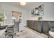 Office space featuring grey walls, built in cabinets, and french doors at 18013 Grey Mossrun Dr, Charlotte, NC 28278