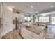 Bright kitchen featuring a large island, stainless steel appliances, and modern pendant lighting at 18013 Grey Mossrun Dr, Charlotte, NC 28278