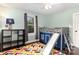 Bright bedroom with a playful bed with slide and colorful chevron rug at 215 S Shaver St, Salisbury, NC 28144