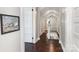 Bright hallway leads to an upstairs room with wood flooring and white trim at 215 S Shaver St, Salisbury, NC 28144