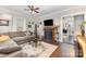 Cozy living room featuring a fireplace, hardwood floors, and neutral decor at 215 S Shaver St, Salisbury, NC 28144