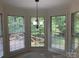 Bright breakfast nook featuring large windows that provide natural light and views of the surrounding greenery at 2222 Raven Dr, Rock Hill, SC 29732