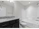 Full bathroom with a granite vanity, a toilet, and shower-tub combo at 2236 Prairie Rd, Concord, NC 28027