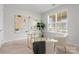 Cozy home office with modern decor, neutral colors, carpet flooring, and plenty of natural light at 2236 Prairie Rd, Concord, NC 28027