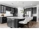 Modern kitchen with stainless steel appliances, sleek cabinetry, and granite countertops at 2236 Prairie Rd, Concord, NC 28027