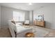 Cozy living room with neutral tones, stylish furniture, and plenty of natural light at 2236 Prairie Rd, Concord, NC 28027