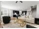 Open-concept floor plan shows the living room, kitchen and staircase with hardwood floors at 2236 Prairie Rd, Concord, NC 28027
