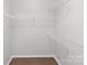 Large walk-in closet with ample shelving and hanging space for storage and organization at 2236 Prairie Rd, Concord, NC 28027