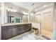 Dual vanity Primary bathroom featuring granite countertops, modern fixtures, a step-in shower, and soothing neutral tones at 2313 Blueberry St, Belmont, NC 28012