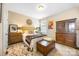 Cozy bedroom featuring a beautiful bed and unique accent pieces throughout the space at 2313 Blueberry St, Belmont, NC 28012