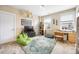 Bedroom with a decorative rug, and a comfortable green beanbag chair for relaxing at 2313 Blueberry St, Belmont, NC 28012