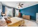Tranquil bedroom with a cozy atmosphere, natural light, and tasteful furnishings including wooden dressers and nightstands at 2313 Blueberry St, Belmont, NC 28012