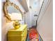 Chic entryway featuring decorative mirror and a bright yellow chest of drawers at 2313 Blueberry St, Belmont, NC 28012