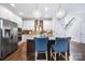 Bright kitchen with stainless steel appliances, granite counters, and pendant lighting at 2313 Blueberry St, Belmont, NC 28012