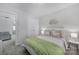 Serene bedroom with cozy bed and neutral tones offers a peaceful setting with ample natural light at 240 Briana Marie Way, Indian Trail, NC 28079