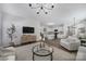Inviting living room with a cozy rug, modern decor, and an open layout to the kitchen at 240 Briana Marie Way, Indian Trail, NC 28079