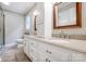 Bright bathroom featuring double sinks, granite countertops, and modern fixtures at 2434 Olewoods Ct, Rock Hill, SC 29732
