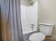 Clean and simple bathroom with a shower-tub combo behind a beige curtain at 2434 Olewoods Ct, Rock Hill, SC 29732